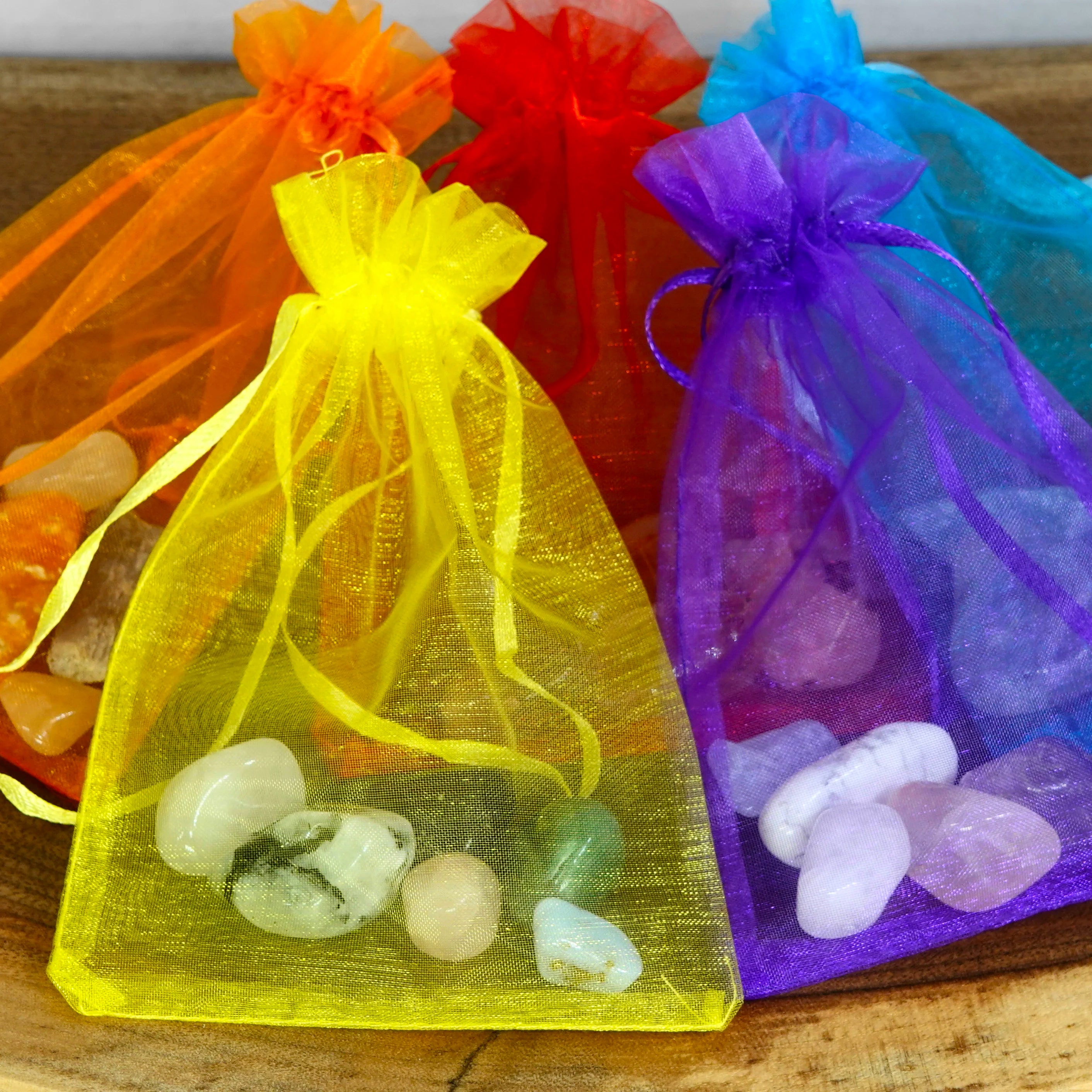 brightly coloured bags with crystals
